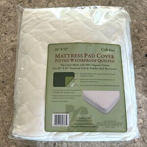Never used crib mattress pad cover waterproof white